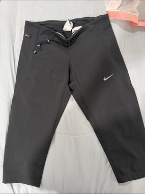 Nike woman Black crop leggings with White Swoosh